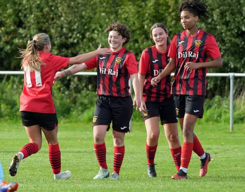 Dursley Town Ladies’ players, from left, Lily Herbert, Lily Ryan, Phoebe Booth and Aleisha Mabombo, have had plenty to celebrate this season. Picture: Brian Rossiter