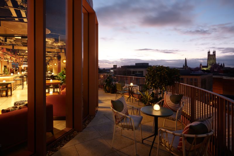 The retro-chic rooftop bar is a light-filled open space