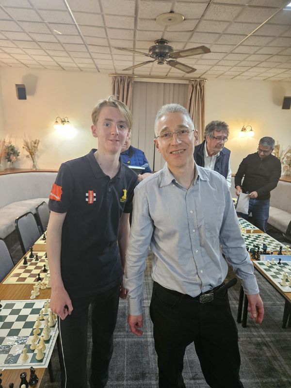 Zach Norris, left, with Grandmaster Michael Adams