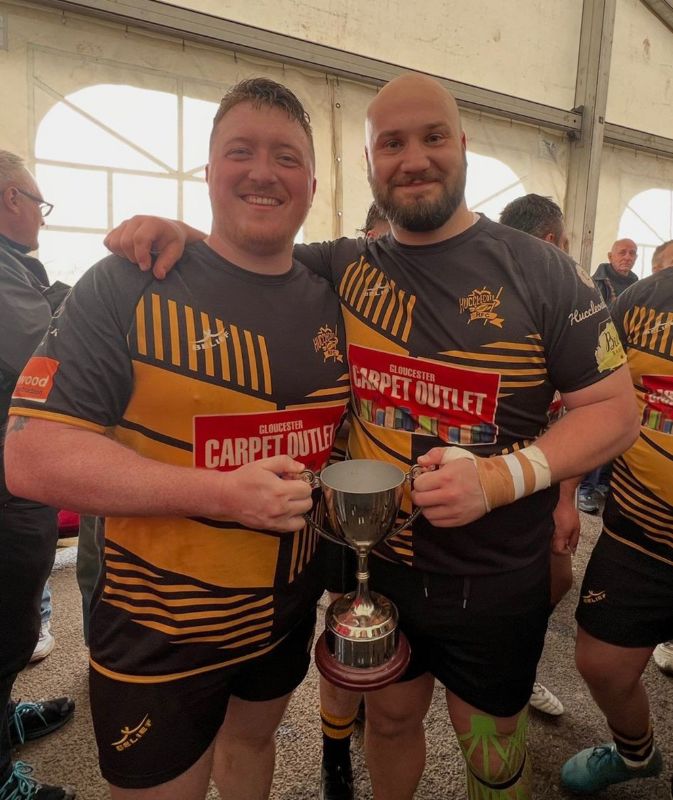 Hucclecote co-captains Jon Hogg, left, and Fred Baldwin-Foot with the North Gloucestershire Combination’s Martin Slatter Junior Cup