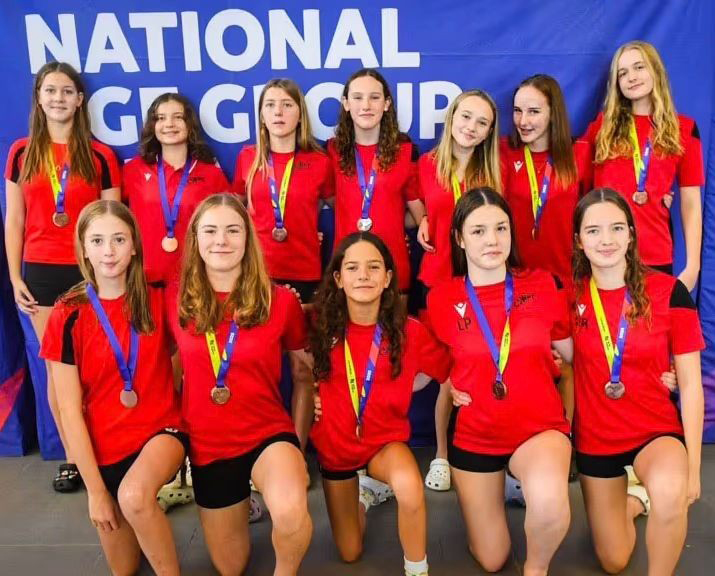 Cheltenham’s under-15 water polo players with their bronze medals. Picture: Will Johnston Photography
