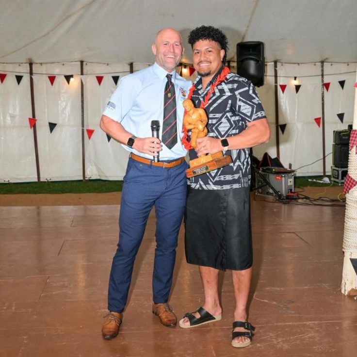 Simanu Lupematasila, right, with Cheltenham North rugby development officer Dan Thomas