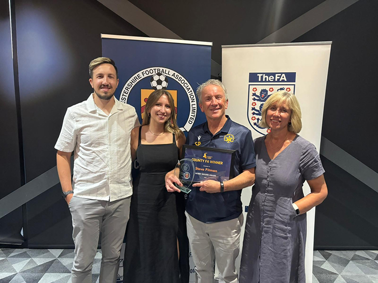 Steve Pitman, second from right, with wife Penny, son Andrew and daughter Becca