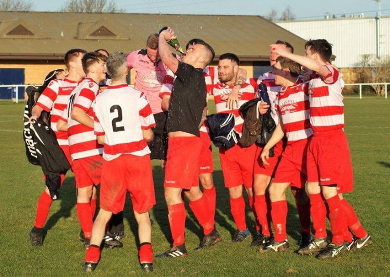 Cheltenham Civil service’s players celebrate their title win