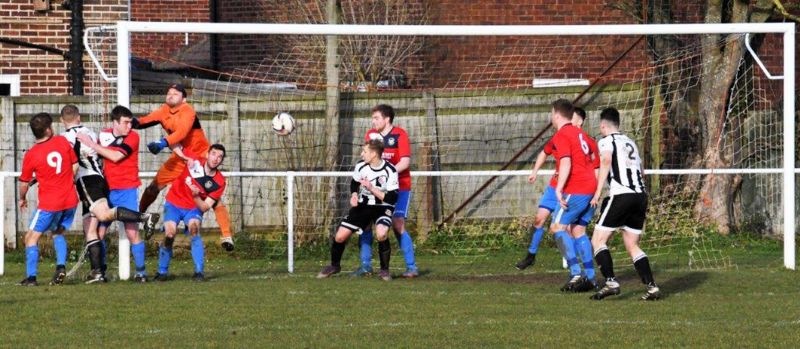 Action from Stonehouse Town v Frampton United in the Les James Cup. Frampton are in the red and blue. Picture, Peter Langley