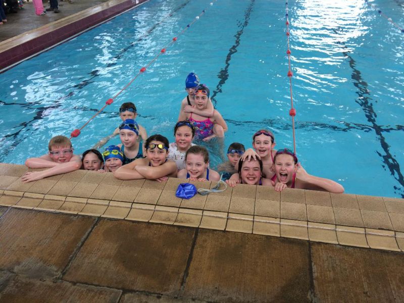 Darcy Howchin (front, fourth from the left) with her swim friends