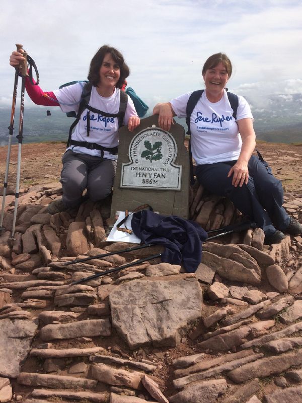 Sarah Sharp and Becky Harris at the top of a mountain