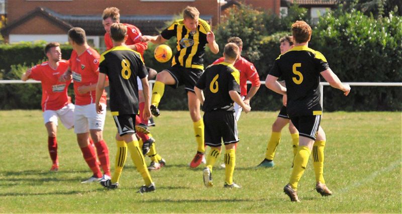Action from Gala Wilton against Patchway Town. Gala are in yellow and black