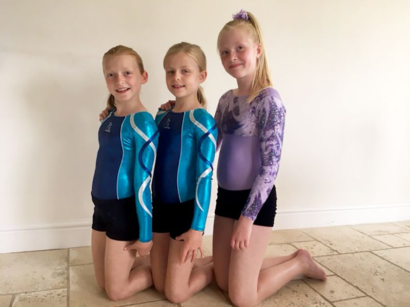 Katie Havill, right, with twins Jess and Sophie