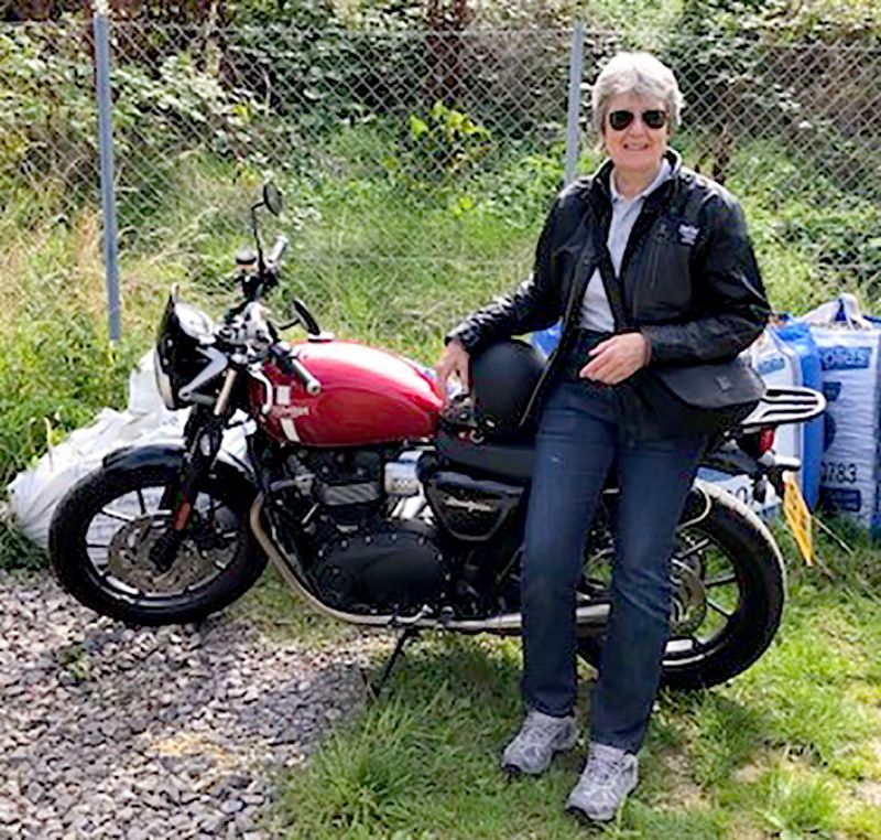 Gloucestershire Netball official Lesley Thomas with her 900cc motorbike