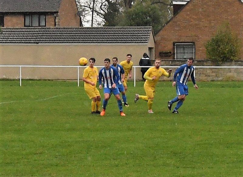 Action from Frampton United (in blue) against Hanham Athletic. Picture, Pete Langley