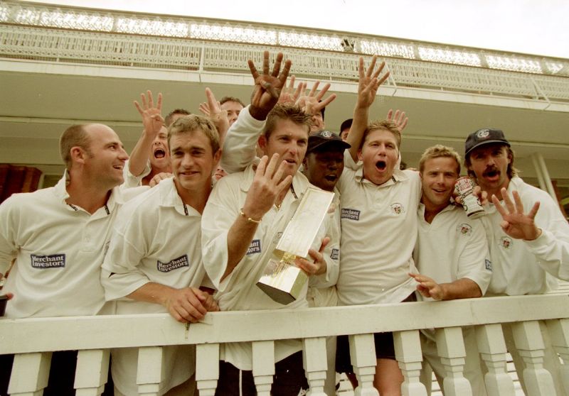 Martyn Ball, third from right, and Gloucestershire celebrate another cup triumph