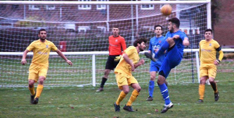 Action from the 2-2 draw between Hardwicke (in blue) and Hanham Athletic. Picture, Pate Langley