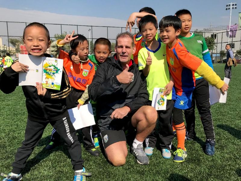 Russ Ralph spent nine months in China coaching youngsters to play football