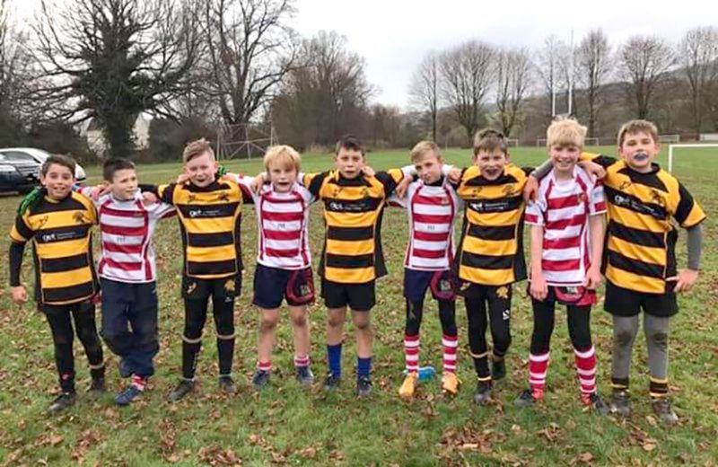 Hucclewick Under-12s in their Painswick and Hucclecote shirts
