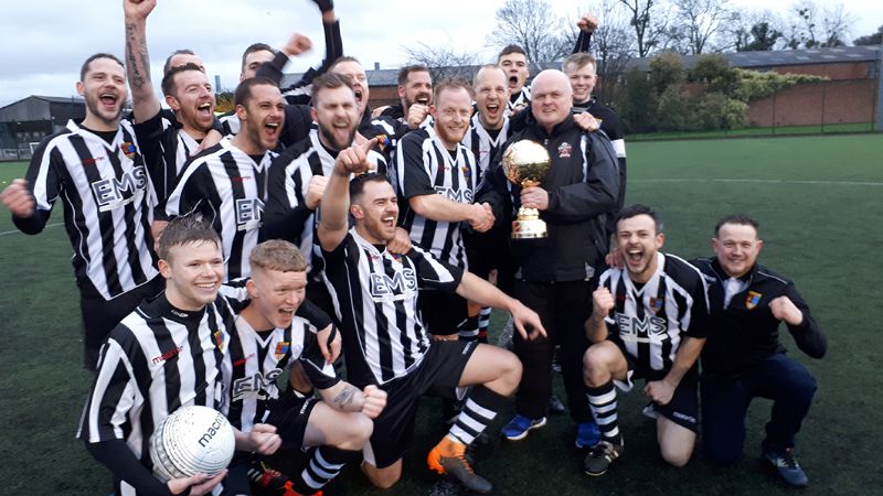 Brockworth Albion Reserves celebrate their Junior Charity Trophy final win