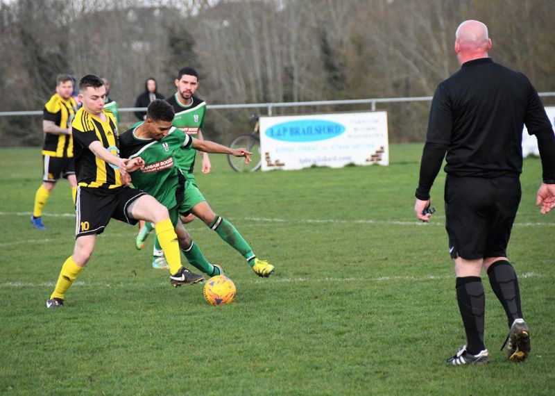 Action from the relegation battle between Southmead CS Athletic and Gala Wilton. Southmead are in green. Picture, Pete Langley