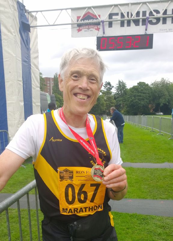 Phillip Howells is all smiles after completing his 200th marathon in Wolverhampton