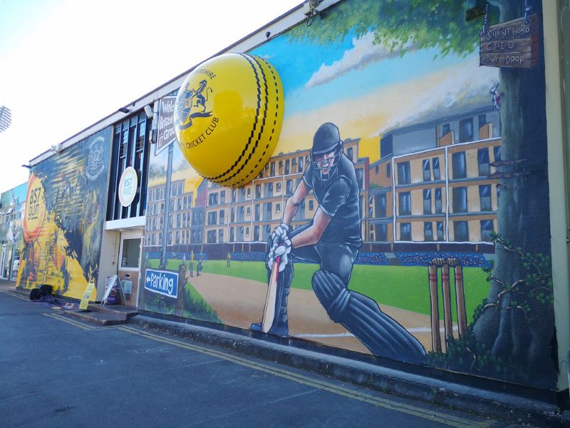 3D Cricket Ball coming out of the wall with the club's crest.