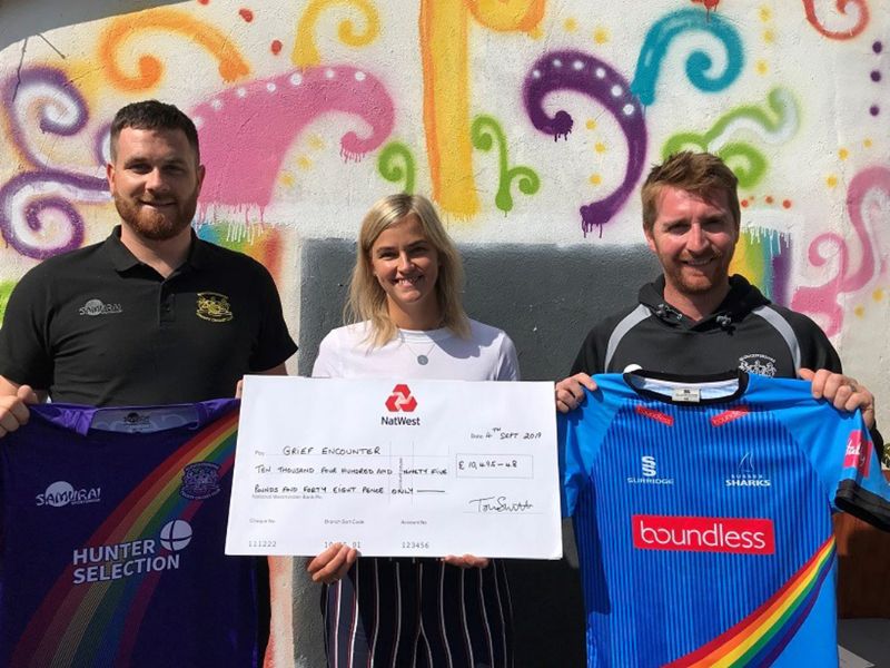 Gloucestershire Cricket community engagement officer Pete Lamb, Grief Encounter fundraising manager Chelsea Harding and Gloucestershire cricketer Tom Smith