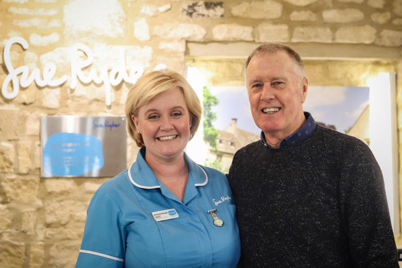 Sue Ryder Nurse, Jenny Hutchinson, with Sir Geoff Hurst who visited Sue Ryder Leckhampton Court Hospice to help launch the event