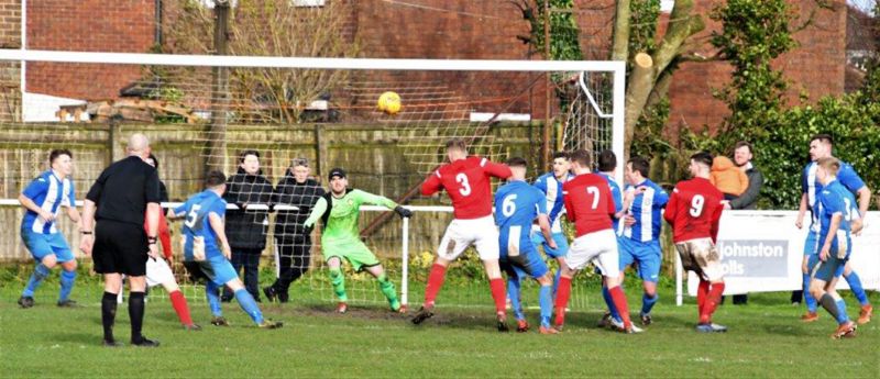 Action from Frampton United (in blue) against Sharpness. Picture, Peter Langley