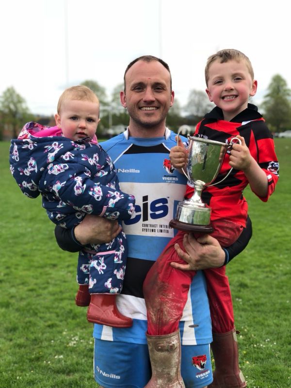 Tom Lait with his children Ottilie and Archie after Cheltenham’s Cheltenham Combination Senior Cup win 2018