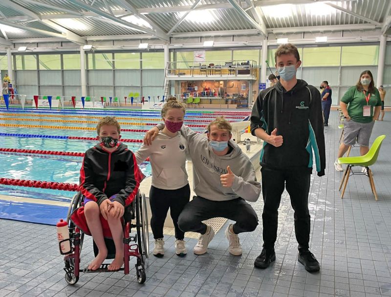 Mckenzie O'Reilly, left, George Kelman-Johns, centre right, and Jacob Wood, right, with world record-holder and Paralympic champion Maisie Summers-Newton at the Para Nationals in Swansea in December