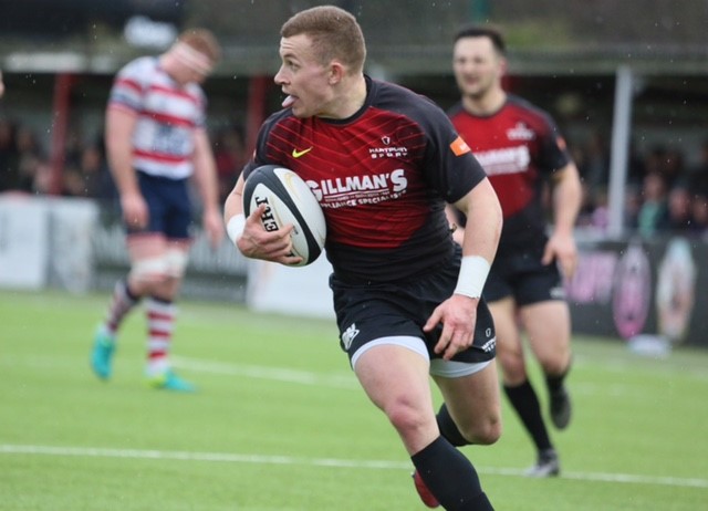 Scrum-half Ben Vellacott scores for Hartpury in their most recent meeting with Rosslyn Park. Picture, Andrew Beacham