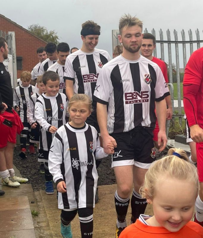 Stonehouse Town players Fin Fowler and Elliott King (in headband)