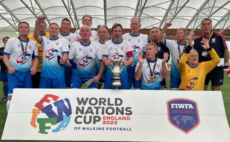 Stuart Langworthy, back row, right, celebrates England Over-60s’ World Nations Cup win