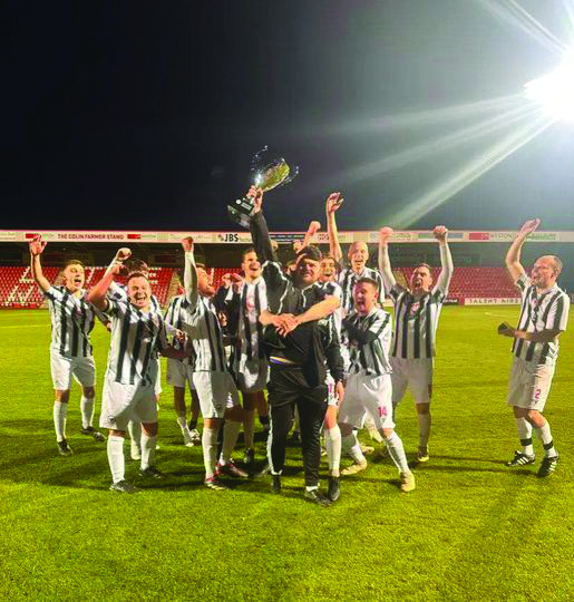Winchcombe Town celebrate their Cheltenham League Senior Charities Cup win