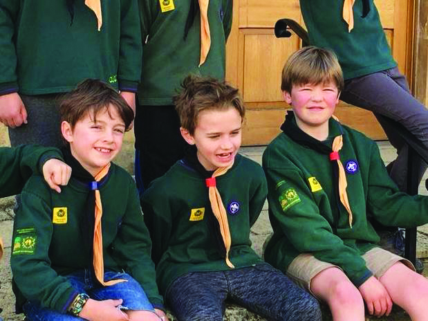 Ellison Dawes, right, with Caspar Hambling, left, and Ollie Burridge in their cub scout days