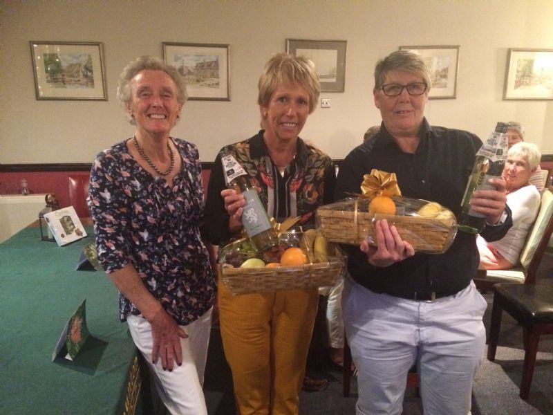 Invitation Day winners Lindy Shurmer and Cass Wright with, left, Naunton Downs ladies’ captain Gill Ashton